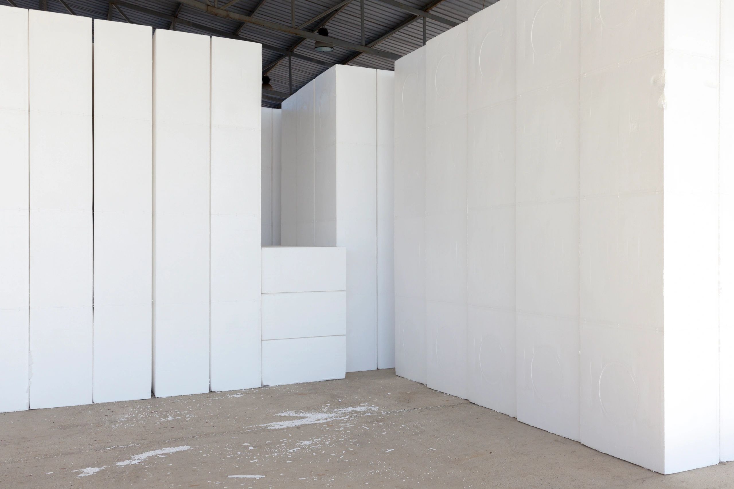 Warehouse-stored EPS foam blocks representing scalable manufacturing and supply